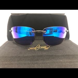 Maui Jim polarized sunglasses.  “Ho’okipa model”